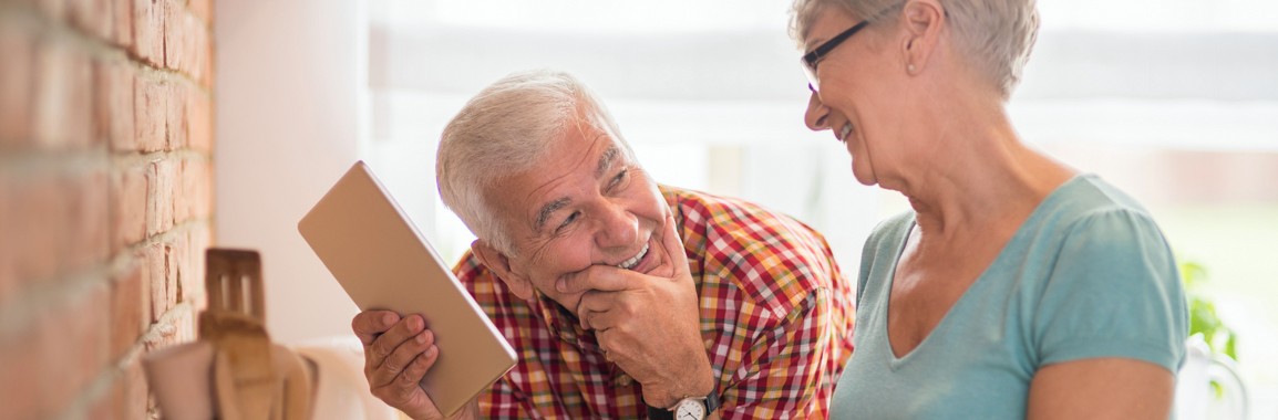 Older couple at home discussed self-managed superannuation.